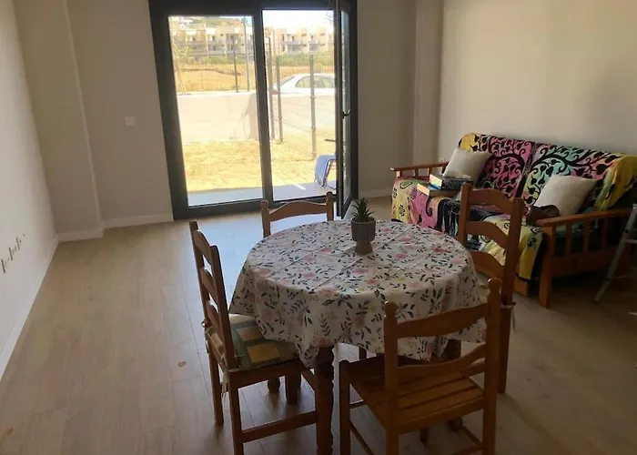Bajo Con Jardin En Primera Linea De Playa * Málaga